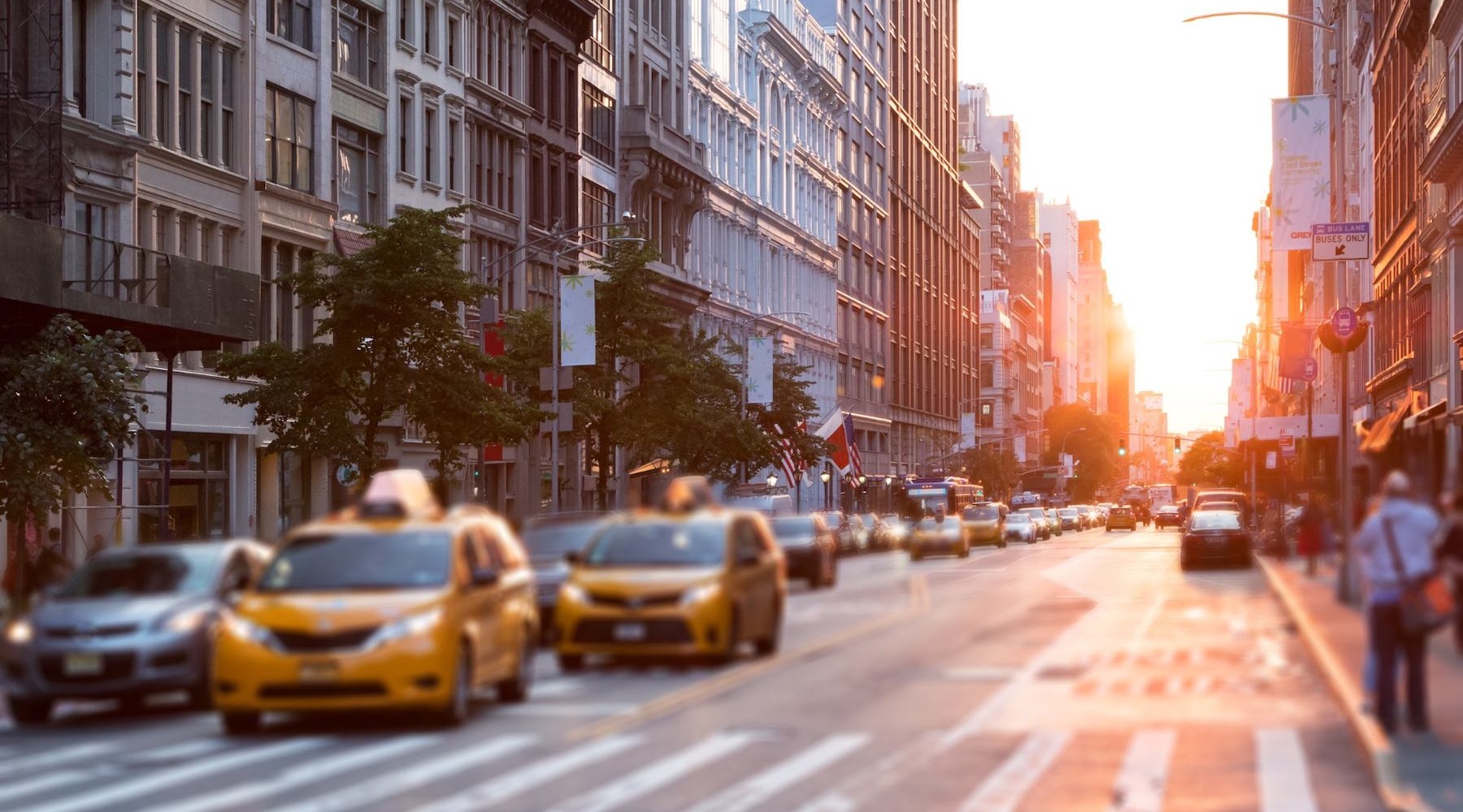 The essence of exceptional living a street view of a city with people and cars