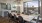 a clubhouse room with a table and chairs