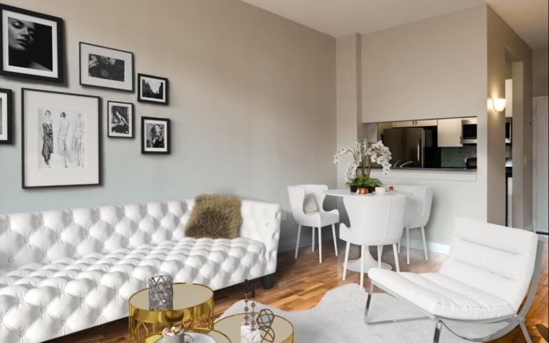 a living room with white furniture