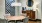 a clubhouse room with a table and chairs