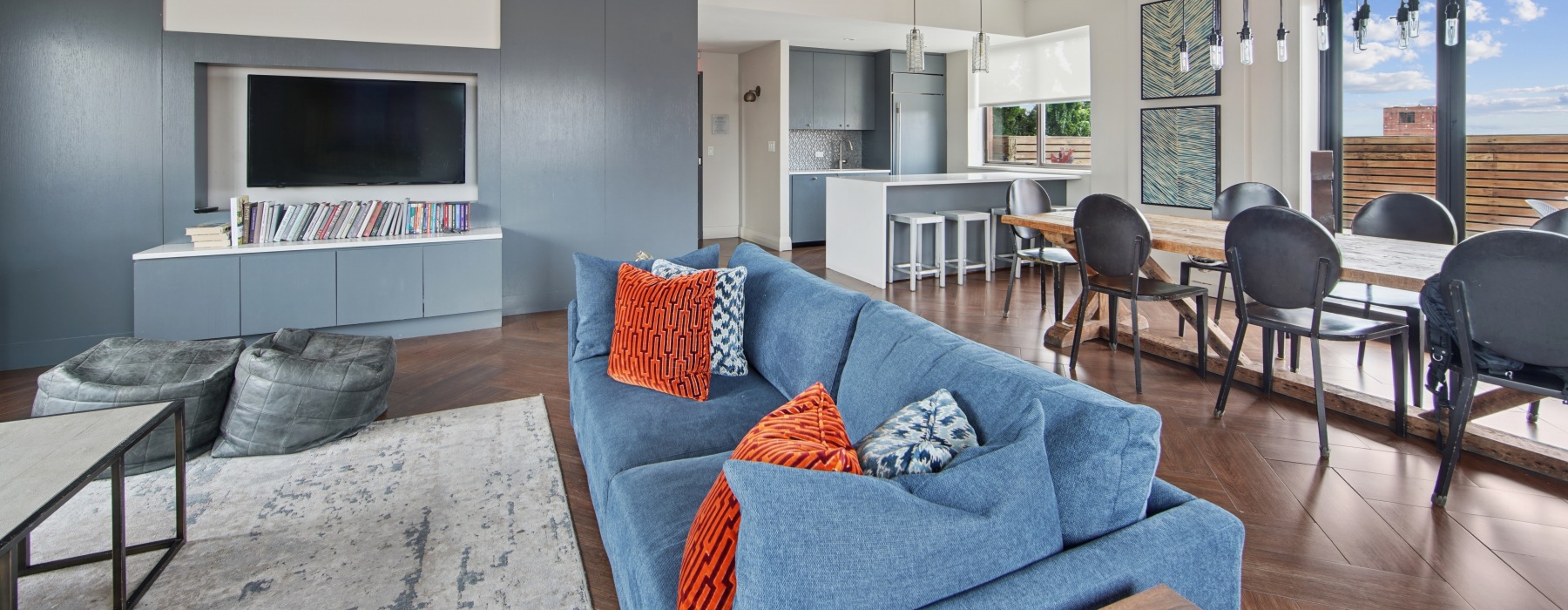 Lounge with couch, table, and chairs.